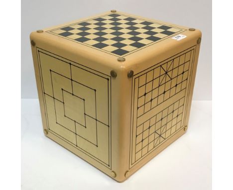 An Alison Henry game cube including Noughts and Crosses, Backgammon, Go, Chess / Draughts, Nine Men's Morris and Chinese Ches