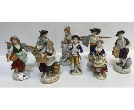 A pair of Sitzendorf figures of "Fisherman and woman", 14 cm high, another pair of Sitzendorf figures of "Man with basket of 