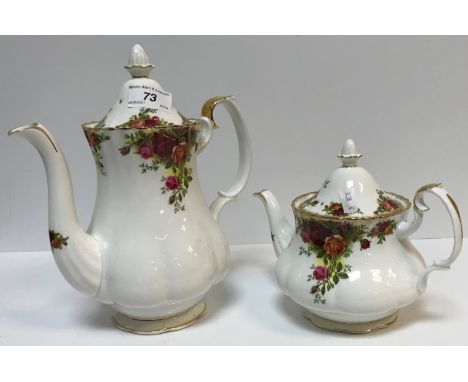 A Royal Albert "Country Roses" tea / coffee service comprising twelve teacups and saucers, four coffee cups and six saucers, 