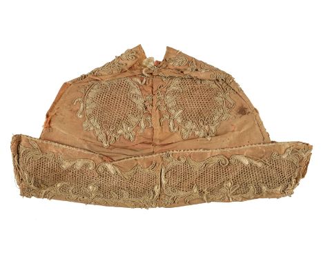 * Nightcap. An early 17th century gentleman's nightcap, hand-stitched pale pink silk cap of four pieced sections with up-turn