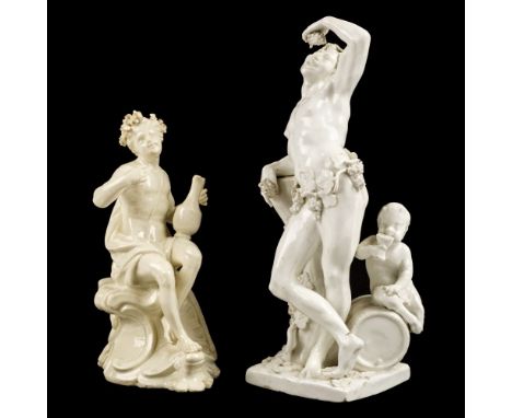 * Blanc de Chine. A pair of Bacchus figures, 19th century, moulded porcelain figures with applied decoration, all-over blanc 