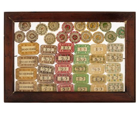 * Game. A collection of early 18th century French ivory counters, a collection of 45 engraved polychrome-stained pieces, comp