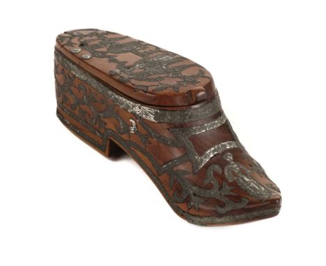 * Snuff box. An 18th century walnut snuff box, carved in the form a ladies shoe, inlaid with pewter, the cover with two coupl