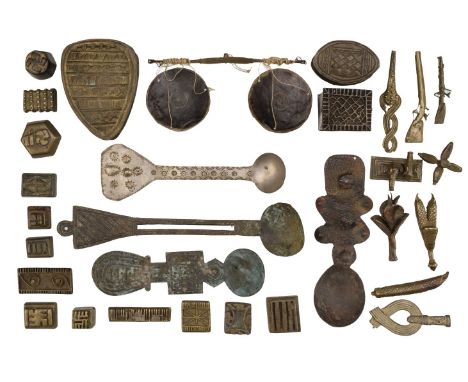 * Ashanti. A collection of gold weights and related items, comprising, a pair of scales, 10 gold dust spoons, 5 gold dust box