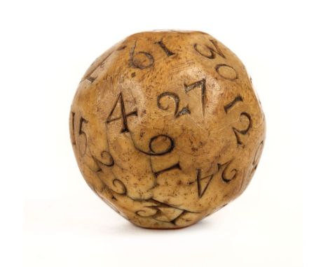 * Gambling ball. A rare ivory gambling ball c.1700, otherwise referred to as a teetotum (lottery), the multi-faceted ball eac