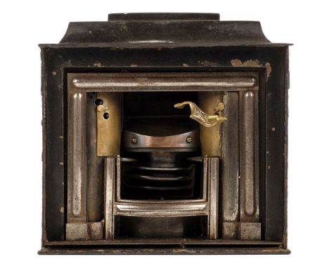 * Automaton. A Victorian miniature stove, the gun metal case with steel and brass centre and grille, with 4 winding holes and