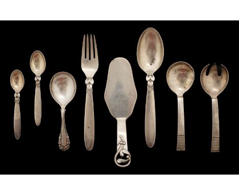 * Georg Jensen. A Georg Jensen silver Cactus dessert spoon and fork designed by Gundorph Albertus c.1930s, various marks, 17c