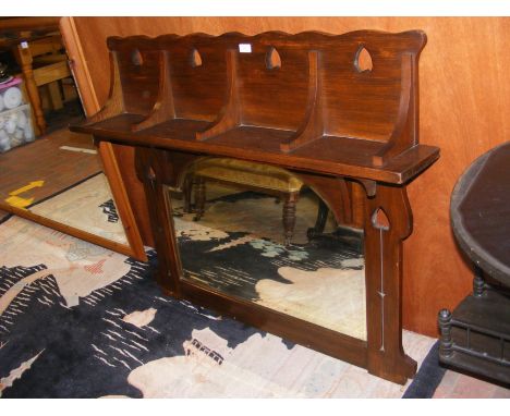 An antique overmantel mirror with carved Art Nouveau design - 114cms wide