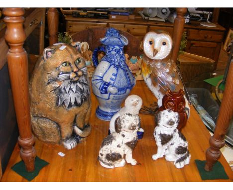 A pair of antique Staffordshire dog ornaments, large ceramic cat
