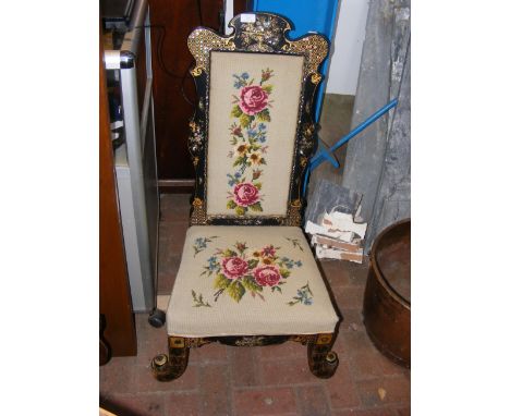 An antique mother of pearl inlaid hall chair with tapestry seat and back rest