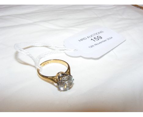 An 18ct gold pale blue stone dress ring CONDITION REPORT Band size K - see additional image.Hallmarked, 18ct.