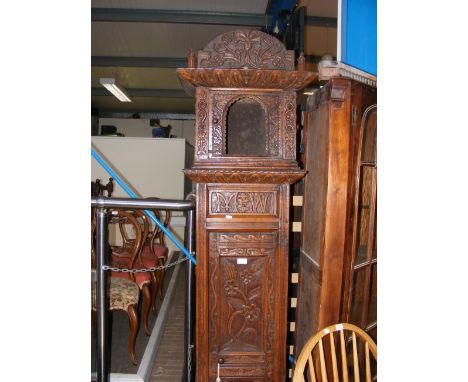 A carved oak Grandfather clock case (no mechanism included)  