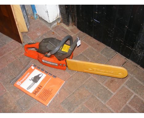 A Husqvarna Model 36 petrol powered chainsaw 