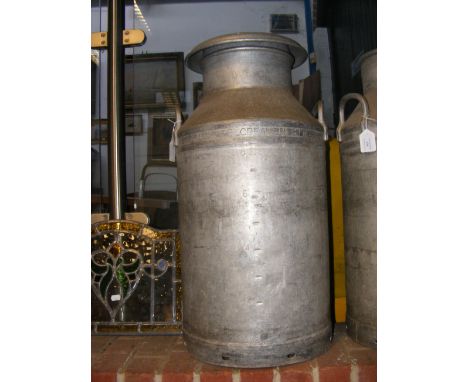 An old Unigate Creameries Ltd. 10 gallon milk churn 