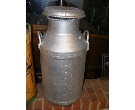 An old Unigate Creameries Ltd. 10 gallon milk churn 