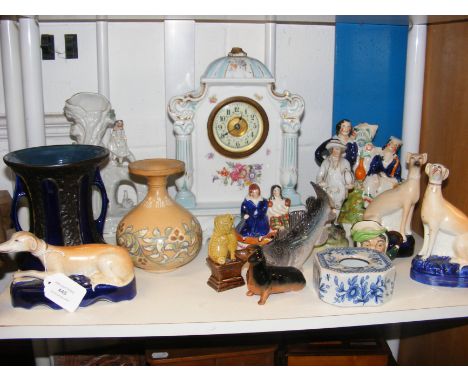 Assorted collectable ceramics, including Victorian Staffordshire figures, miniature Royal Doulton character jug, mantel clock