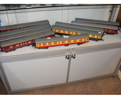 A shelf of plastic Lima 0 gauge carriages