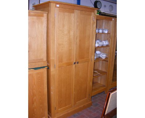 A contemporary light oak Lady's Robe wardrobe with square metal handles - width 95cm 