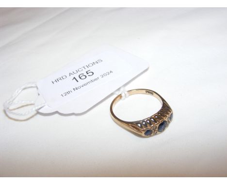 A sapphire and diamond dress ring in gold setting