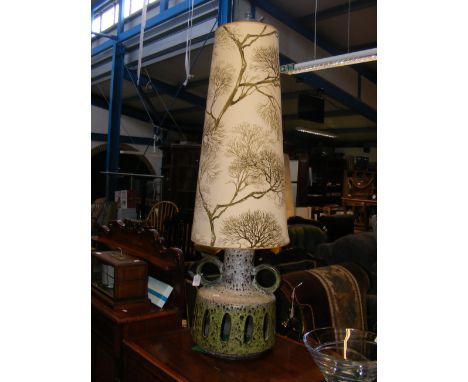 A large German pottery table lamp with shade