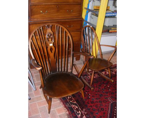 An Ercol stick back rocking chair, together with an armchair