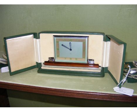 A stylish Art Deco Smiths chrome and Bakelite mantel clock in travelling case CONDITION REPORT workingOur team of trusted exp