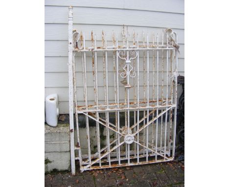A pair of wrought iron gates - each approx. 100cm  CONDITION REPORT Height of gates, 134cmHeight of gate post (there is only 
