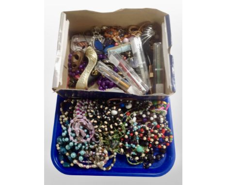 A tray of assorted costume beads, pens, wrist watches, Swatch watch in box etc 