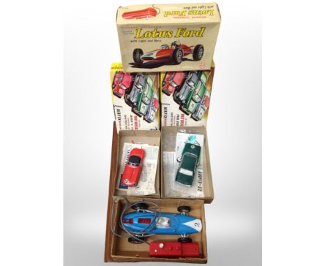 An Airfix 1:32 scale Jaguar E-type construction kit, similar Ford Zodiac construction kit and a Marx Toys battery operated Lo