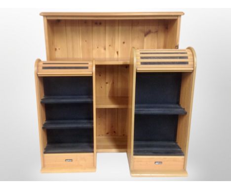 A contemporary pine open bookcase, width 84 cm together with two shutter fronted storage cabinets and a contemporary lamp tab