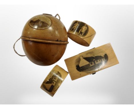 A Mauchline ware string box, trinket box and two napkin rings 