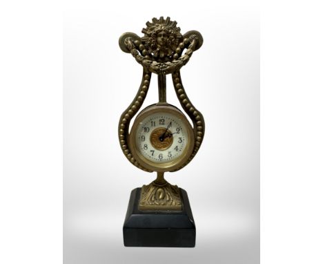 A late Victorian gilt brass lyre-shaped mantel clock, height 22 cm 