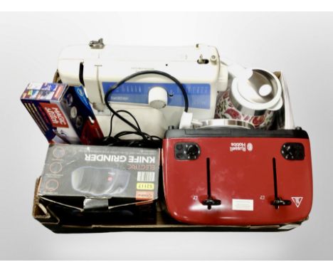 A box of Brother electric sewing machine, Russell Hobbs toaster, electric knife grinder etc 