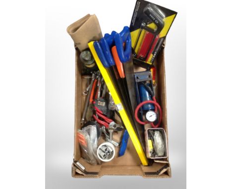 A box of tools, hand saws, foot pump, drill bits, socket set, tape measures 