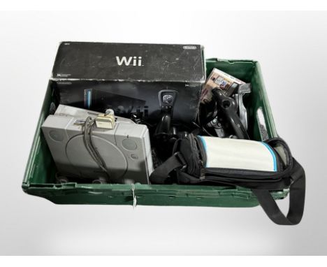 A box of Playstation 1 console, Nintendo Wii, assorted controllers etc 