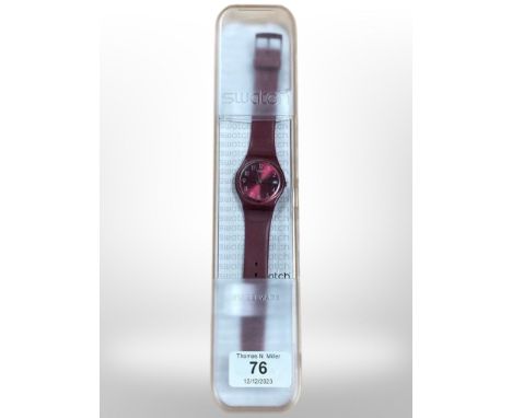 A Swatch watch in original box 