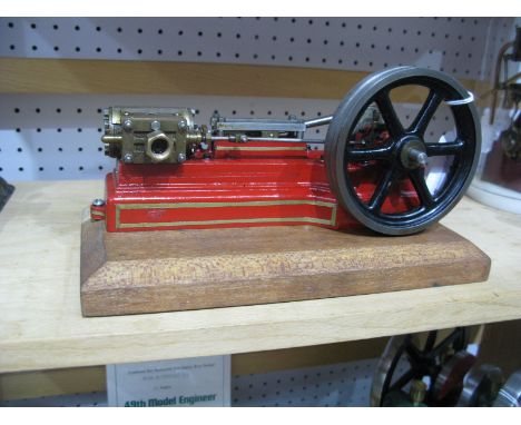 A Stuart Horizontal S50 Mill Steam Engine, 8½ inch base mounted on wooden plinth.