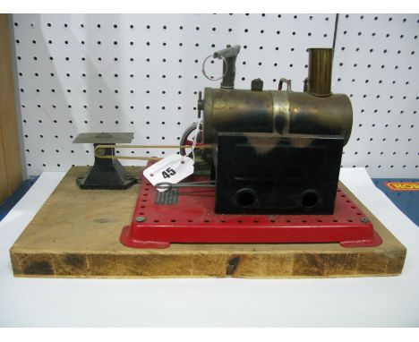 A Mamod Stationery Steam Engine , with associated accessory, playworn.