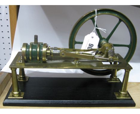 A XIX Century Brass Model by Model Dockyard of a Simple Horizontal Steam Engine, single cylinder, raised on 4 pillars and sta