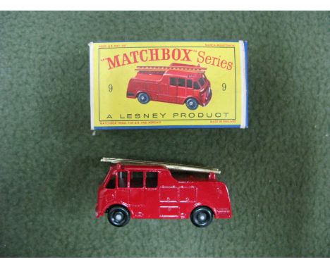 Matchbox Regular Wheel No 9  Fire Truck, black wheels, gold ladder, very good, Boxed, slight crushing and staining to box.