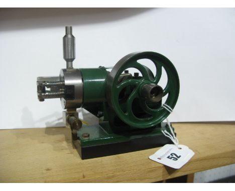 A Well Engineered Model Petrol Engine, 2 3/4 inch flywheel.