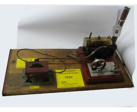 A 1930's Toy Shop Steam Horizontal Boiler and Engine, by Fleischmann with a contemporary belt driven circular saw, chimney st