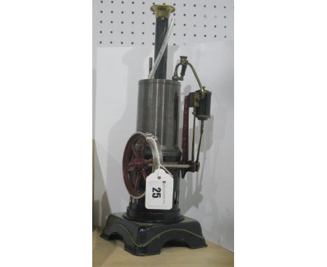 An Early XX Century Vertical Toy Shop German Steam Engine, single cylinder, enamel base, water gauge, burner present. No obvi