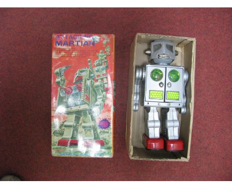 An Original Japanese Tinplate Robot - 'Attacking Martian', battery operated, silver. some corrosion to battery box. Boxed