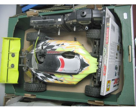 A Fuel Powered Radio Controlled Off Road Buggy, 20" long, two radio control transmitter systems including Futaba fp-tsl9k, tw