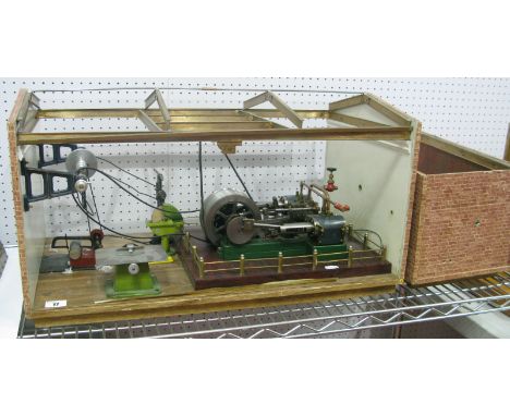 An Engineered and Toy Shop Model of a Steam Driven Workshop, comprising of engineered twin cylinder engine, multi belt flywhe