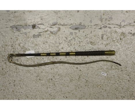 A beagling whip with plaited string shaft mounted with brass ferrule stamped "M.H.M. & Son, Maker, London Steel-Lined" with t