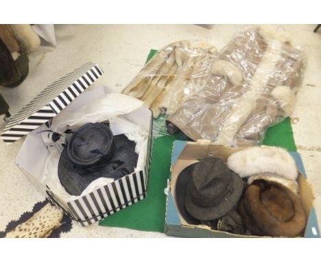 A light brown and cream musquash jacket, together with a faux fur lined coat, a box of hats to include mink pillbox hat, vari