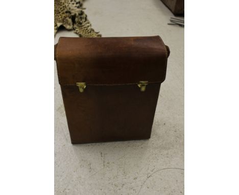 A leather three-section drink satchel with Bebrit bakelite flask cover