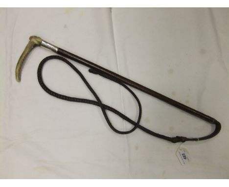 A gents riding crop with plaited leather shaft and silver ferrule initialled "FEL from HH 1907", bears button inscribed "Swai